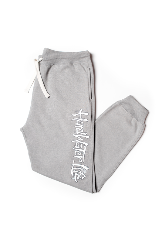 Grey throwback jogger style with rib knit cuffs. Cotton/Polyester blend. HardWater Life printed in white and grey outlink ink down left leg